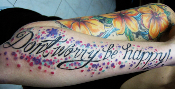 For this week's Tattoo Tuesday we came across this colorful script tattoo on