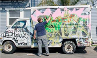 Dcypher Painting Graffiti On A Truck